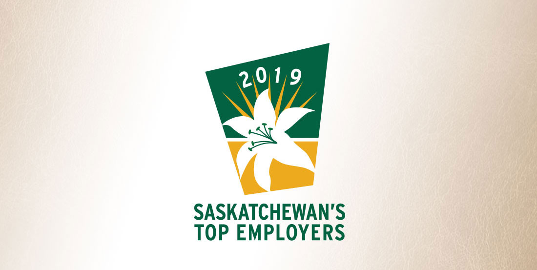 Top Saskatchewan Employer logo on leather background
